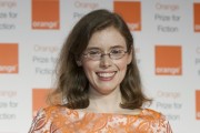 Madeline Miller holds her statuette after winning the Orange Prize